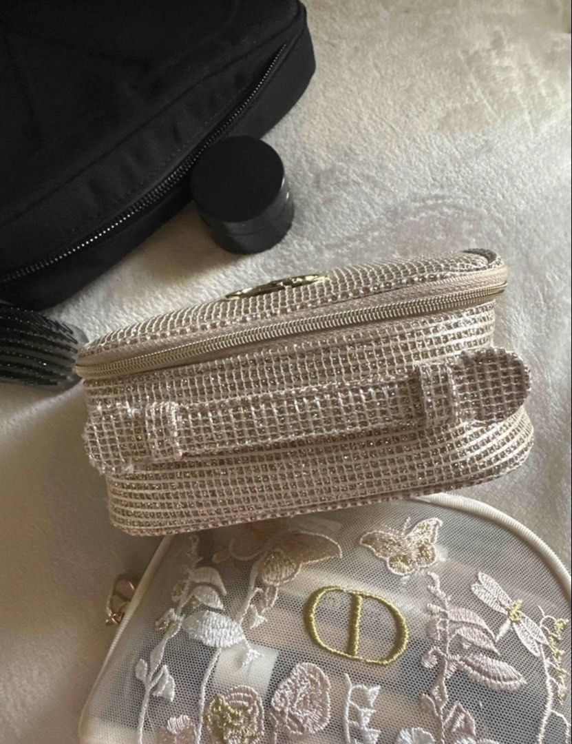 Dior Glitter Cosmetic Bag with Makeup (Category: Luxury Bags & Wallets) located in Manila. Submitted by dianaclutz (Listing ID 1443734242, Image 2). Description: - Cute Dior makeup bag - Sparkly glitter material - Perfect for travel or everyday use - Zipper closure - No box included.