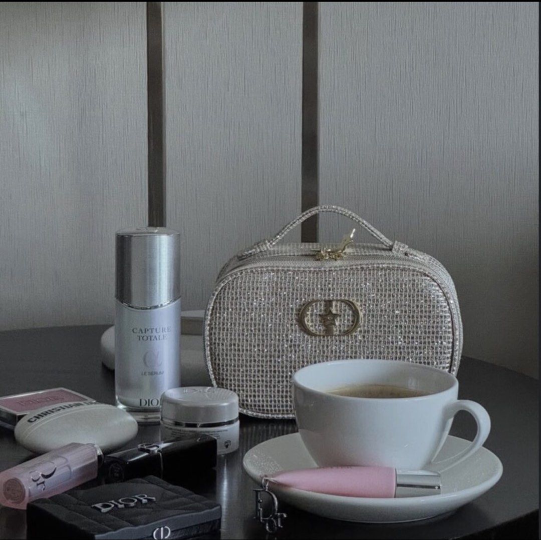 Dior Glitter Cosmetic Bag with Makeup (Category: Luxury Bags & Wallets) located in Manila. Submitted by dianaclutz (Listing ID 1443734242, Image 3). Description: - Cute Dior makeup bag - Sparkly glitter material - Perfect for travel or everyday use - Zipper closure - No box included.