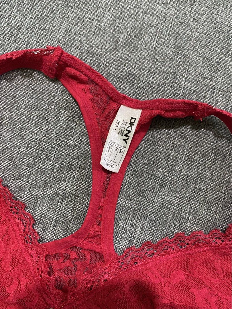 DKNY Red Lace Racerback Bralette Size L (Category: Sleeveless) located in Manila. Submitted by andee. (Listing ID 1443745438, Image 3). Description: - Brand: DKNY - Color: Red - Style: Bralette - Material: Lace all over - Details: Scalloped hem, racerback, small metal DKNY charm in front - Size: L - Usage: Great for layering or lounging.