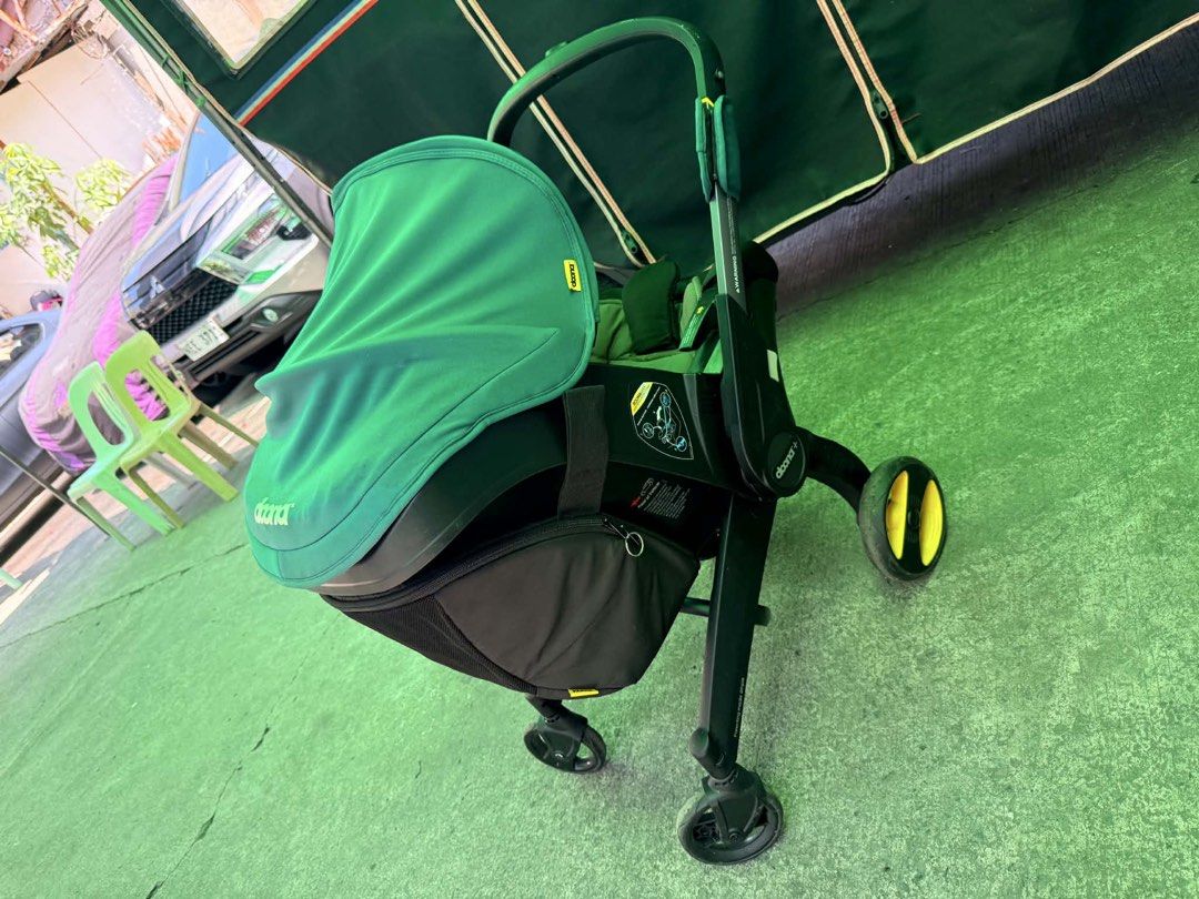 Doona Infant Car Seat Stroller - Green (Category: Strollers) located in Manila. Submitted by kyladp (Listing ID 1443778513, Image 2). Description: - Doona infant car seat and stroller combo - Converts from car seat to stroller in seconds - Easy to use and transport - Stylish and practical green color - Folds compactly for storage - Ideal for on-the-go parents and travel with baby With Doona infant insert and Doona bag Pwede sa newborn up to 2 yrs