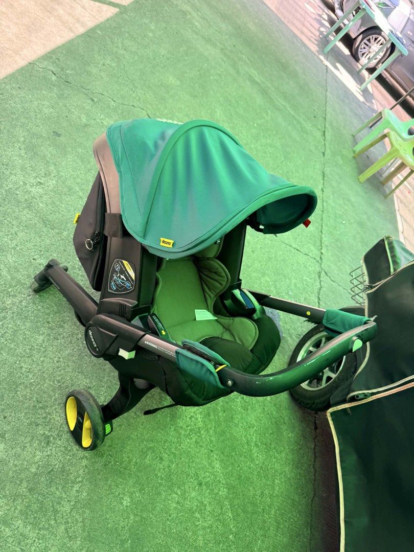 Doona Infant Car Seat Stroller - Green (Category: Strollers) located in Manila. Submitted by kyladp (Listing ID 1443778513, Image 1). Description: - Doona infant car seat and stroller combo - Converts from car seat to stroller in seconds - Easy to use and transport - Stylish and practical green color - Folds compactly for storage - Ideal for on-the-go parents and travel with baby With Doona infant insert and Doona bag Pwede sa newborn up to 2 yrs