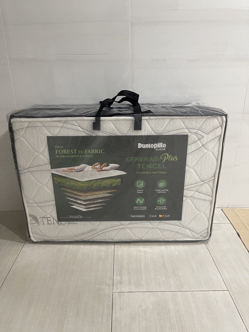 Dunlopillo Klasik 3 fold Mattress (Tencel material) (Category: Bed Frames & Mattresses) located in Singapore. Submitted by gcfire (Listing ID 1443827855, Image 1). Description: Dunlopillo Klasik 3 fold Mattress (Tencel material) Generasi Plus Tencel Foldable Mattress - Tencel Fabric - Space Saving and Convenient - Long Lasting Softness - Enhanced Breathability - 4 inch Thickness ** collect at mrt station # foldable mattress # 3 fold mattress # te