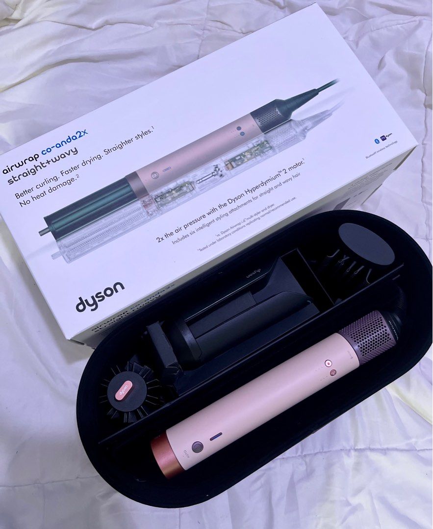 Dyson Coanda 2x In Ceramic Pink (Category: Hair) located in Manila. Submitted by marjeleyn (Listing ID 1443857807, Image 1). Description: ✨ DYSON AIRWRAP CO-ANDA 2x ✨ The next-level styling experience from Dyson 🤍 Achieve curls, waves, smooth blowouts, and volume with powerful airflow and Coanda technology — for salon-inspired hair styles at home ✨ 📌 Details: ✔️ Dyson Airwrap Co-anda 2x ✔️ 220V (compatible for PH use) ✔️ Purchased via pasabuy ✔