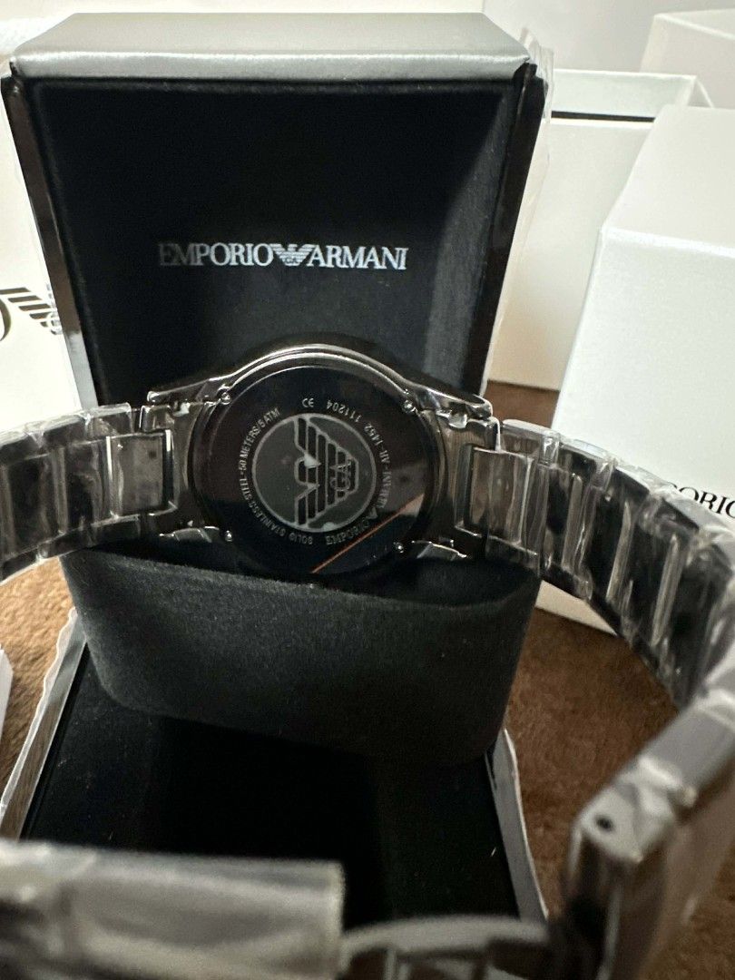 Emporio Armani Chronograph Watch (Category: Men's Watches) located in Caloocan City. Submitted by fashion_bt (Listing ID 1443734728, Image 3). Description: - Chronograph Watch - Sleek Dark Metal Casing and Strap - Comes with Original Box and Papers - Versatile for Everyday or Special Occasions 4500.00 + sf.