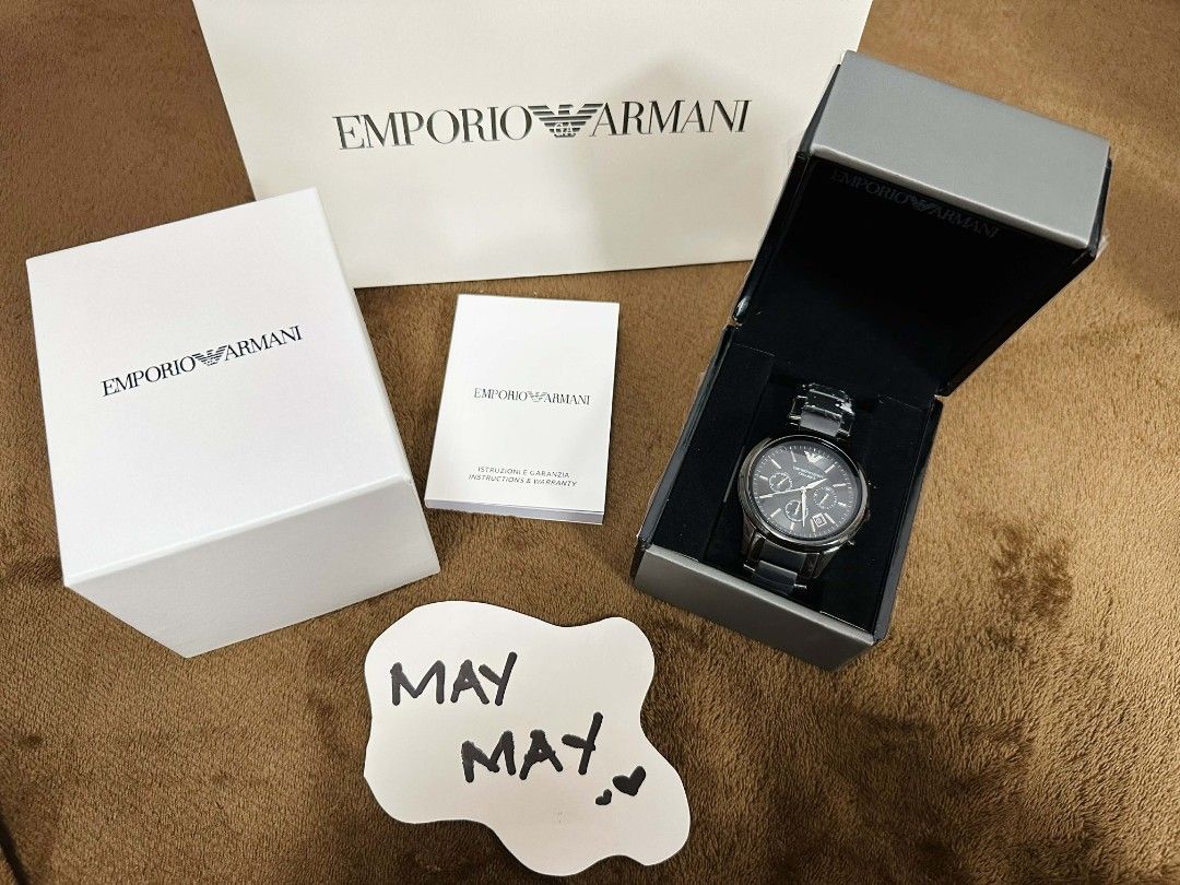Emporio Armani Chronograph Watch (Category: Men's Watches) located in Caloocan City. Submitted by fashion_bt (Listing ID 1443734728, Image 1). Description: - Chronograph Watch - Sleek Dark Metal Casing and Strap - Comes with Original Box and Papers - Versatile for Everyday or Special Occasions 4500.00 + sf.
