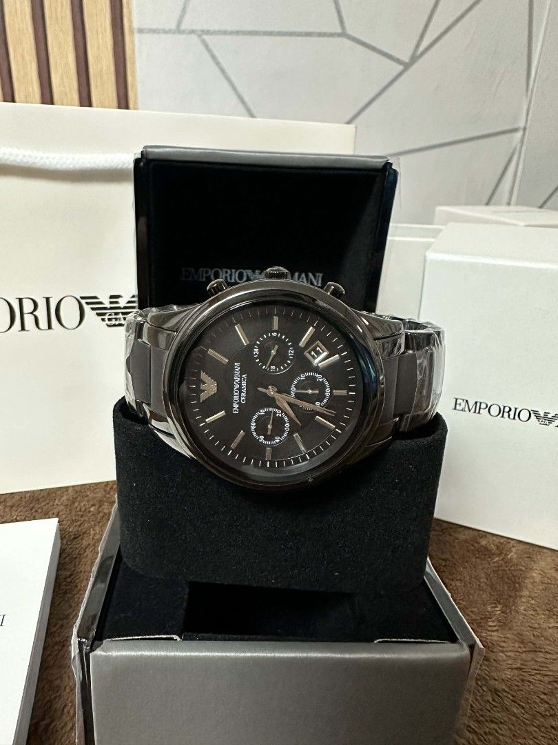 Emporio Armani Chronograph Watch (Category: Men's Watches) located in Caloocan City. Submitted by fashion_bt (Listing ID 1443734728, Image 2). Description: - Chronograph Watch - Sleek Dark Metal Casing and Strap - Comes with Original Box and Papers - Versatile for Everyday or Special Occasions 4500.00 + sf.