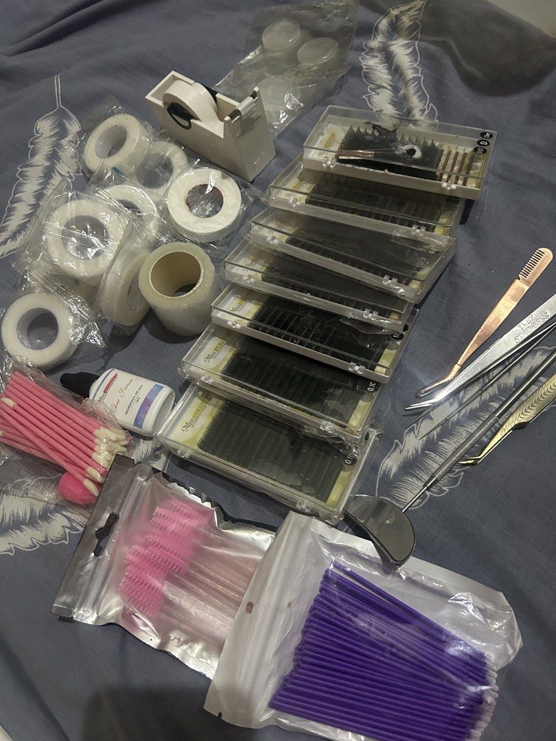 Eyelash Extension Tools and Supplies Set (Category: Makeup) located in Pasig City. Submitted by metrohotelsupply (Listing ID 1443825600, Image 1). Description: - Complete set for eyelash extensions - Includes multiple trays of lashes - Various tweezers included - Lash tape and applicators - Lash brush and glue bottle - Ideal for lash artists and DIY enthusiasts Reason: hindi ko nagamit, no longer needed.
