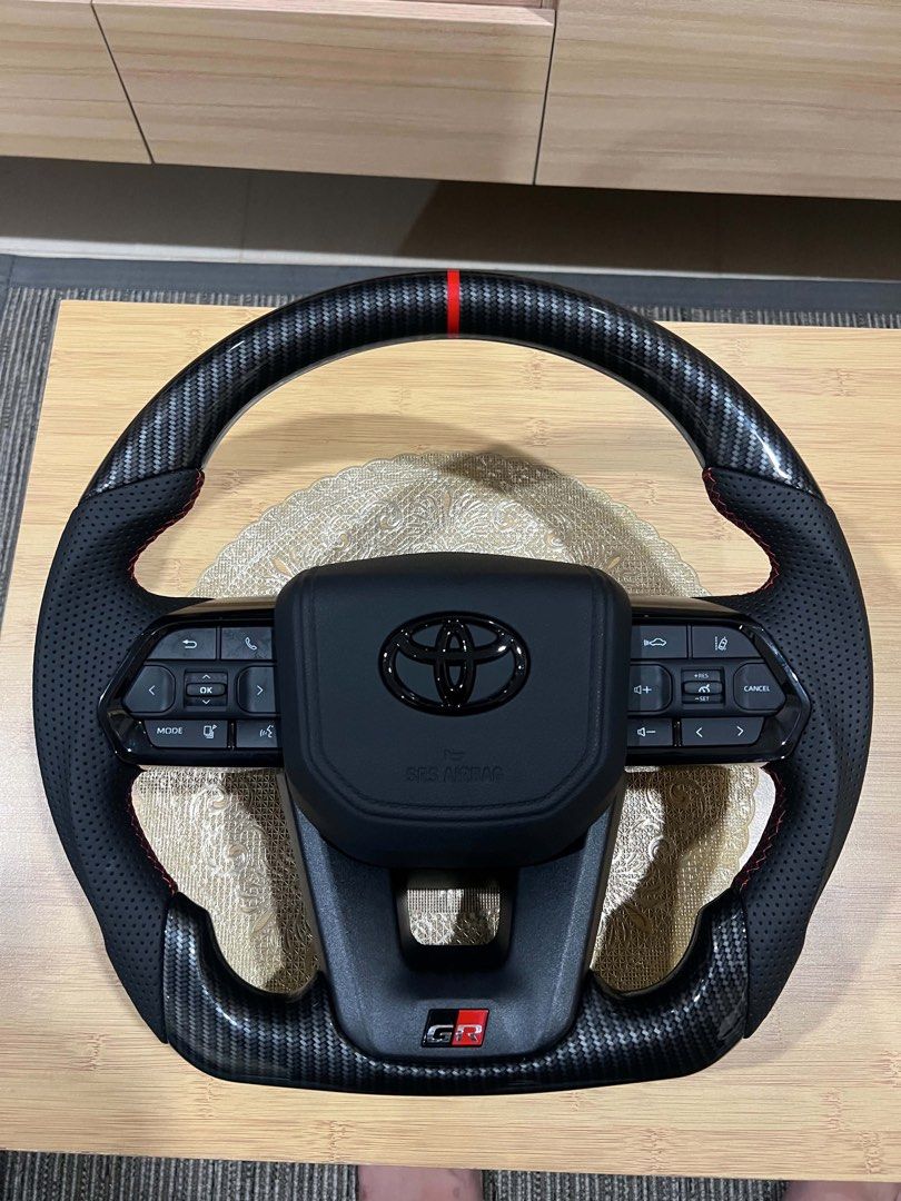 FORSALE STEERING WHEEL CARBON LC300 (Category: Other Automotive Parts and Accessories) located in Las Pinas. Submitted by jalani01 (Listing ID 1443895403, Image 2). Description: Forsale steering wheel Carbon LC300 ORIGINAL MADE IN THAILAND No issue Dilang nagamit Pwede sa Fortuner Hilux Rush Vios Hiace .