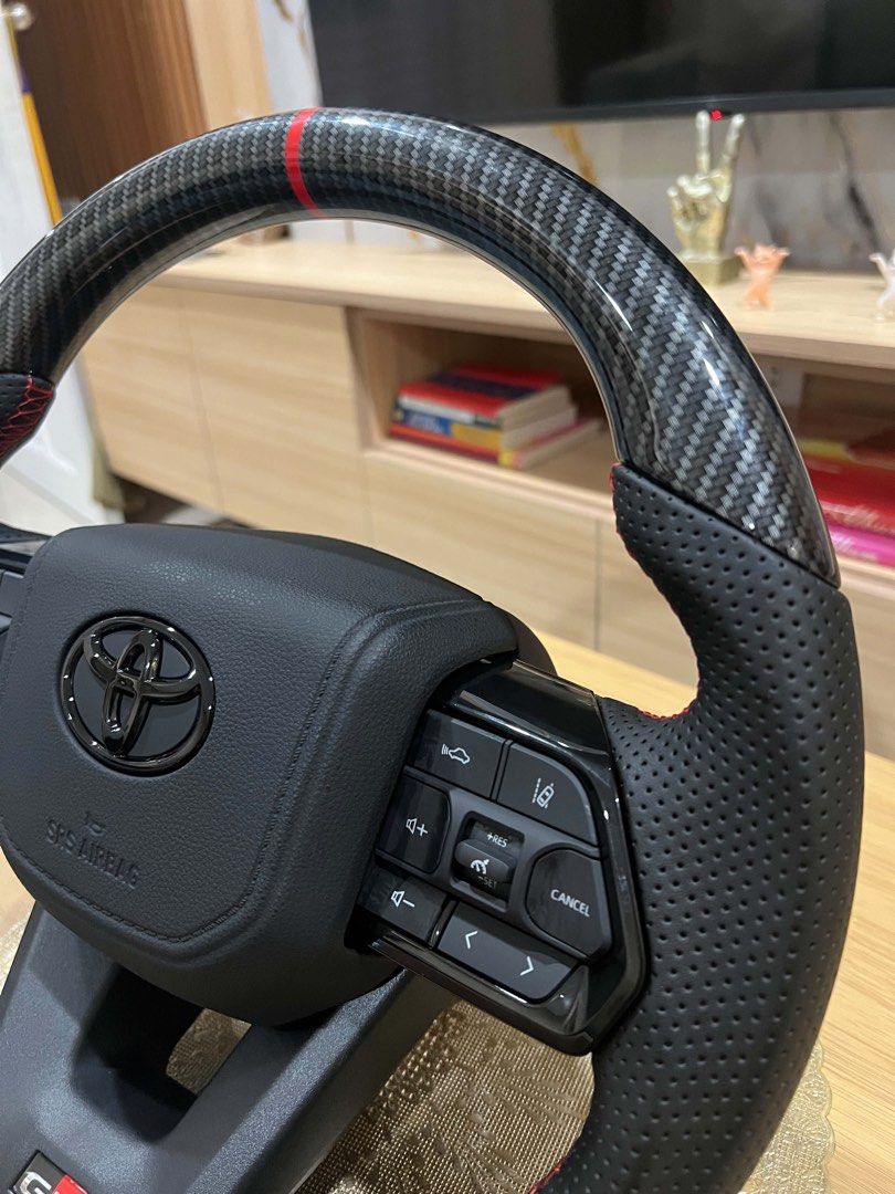 FORSALE STEERING WHEEL CARBON LC300 (Category: Other Automotive Parts and Accessories) located in Las Pinas. Submitted by jalani01 (Listing ID 1443895403, Image 1). Description: Forsale steering wheel Carbon LC300 ORIGINAL MADE IN THAILAND No issue Dilang nagamit Pwede sa Fortuner Hilux Rush Vios Hiace .