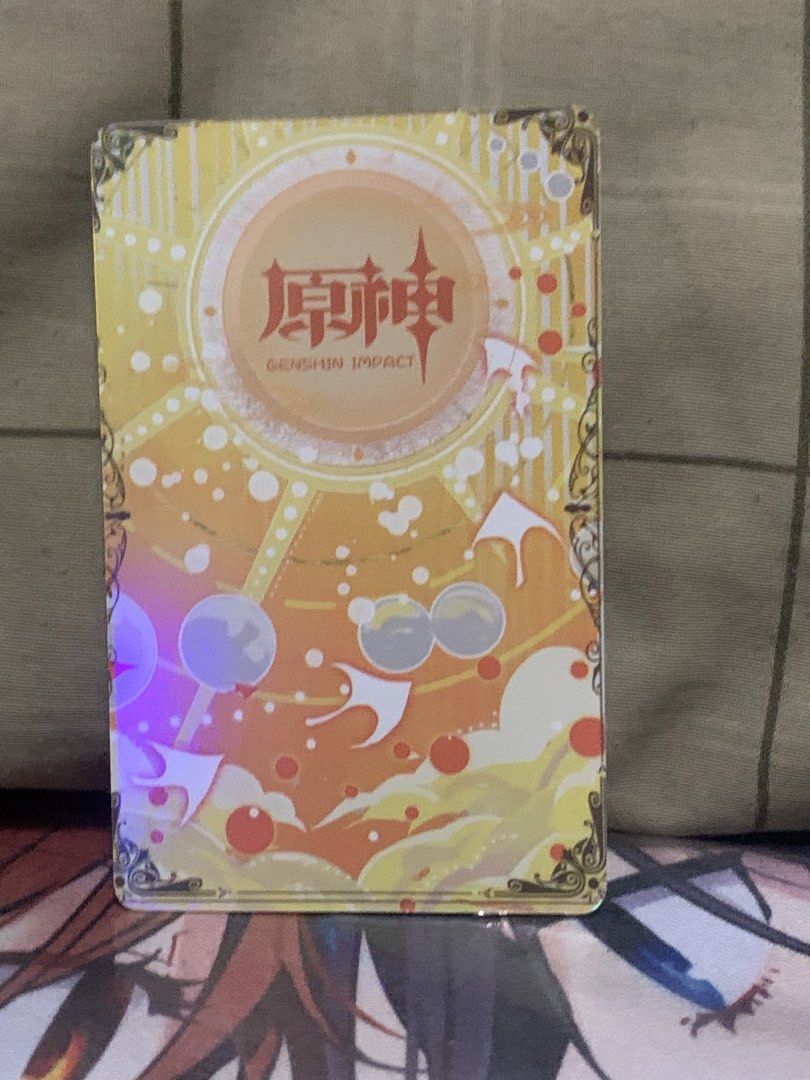 Genshin Impact Holographic Card - Eula (Please see description) (Category: Raw Singles) located in Manila. Submitted by inari05 (Listing ID 1443843164, Image 2). Description: - Holographic Eula card from Genshin Impact - Front: Eula in a summer dress - Back: Genshin Impact logo - Shiny and eye-catching design - Ideal for collectors and fans of the game -Asking 30 -Sf charged to buyer -Good condition -First owner rfs:need space Payment:Gcash.