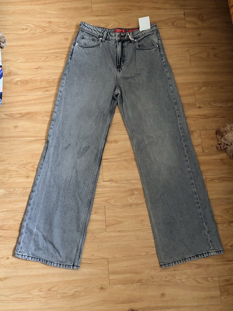 Guess Grey Wide Leg Jeans Size 30 (Category: Jeans) located in Pasig City. Submitted by nikkiniksniks (Listing ID 1443769337, Image 3). Description: - Brand: Guess - Style: Wide leg jeans - Rise: High waisted - Color: Grey - Perfect for creating a casual look. -Overrunsss, meron syang mga markings(splash nung dye) -But still verry good condition Hard denim non stretch.