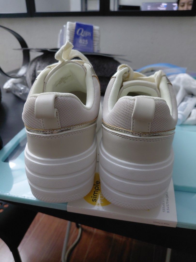 GUESS Platform Sneakers Cream Gold Logo (Category: Sneakers) located in Quezon City. Submitted by jrodf (Listing ID 1443735034, Image 3). Description: - Cream colored GUESS platform sneakers - All-over GG logo pattern - Gold accents on sides and lace loops - Chunky white platform sole - Lace-up closure - Super cute and stylish! -size 9.5.