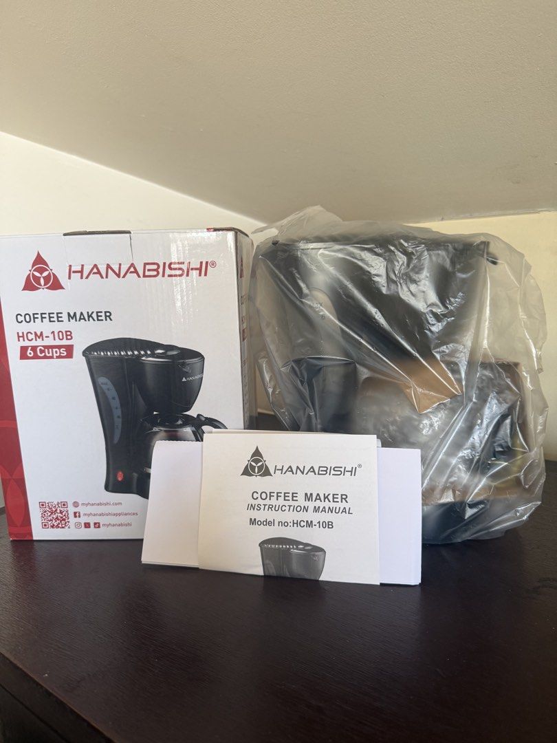Hanabishi Coffee Maker HCM-10B 6 Cups (Category: Coffee Machines & Makers) located in Quezon City. Submitted by erlinda_ivy (Listing ID 1443762584, Image 2). Description: - Hanabishi Coffee Maker (Model: HCM-10B) - Makes up to 6 cups of coffee - Comes with original instruction manual - Original box included - Ideal for your morning coffee routine.