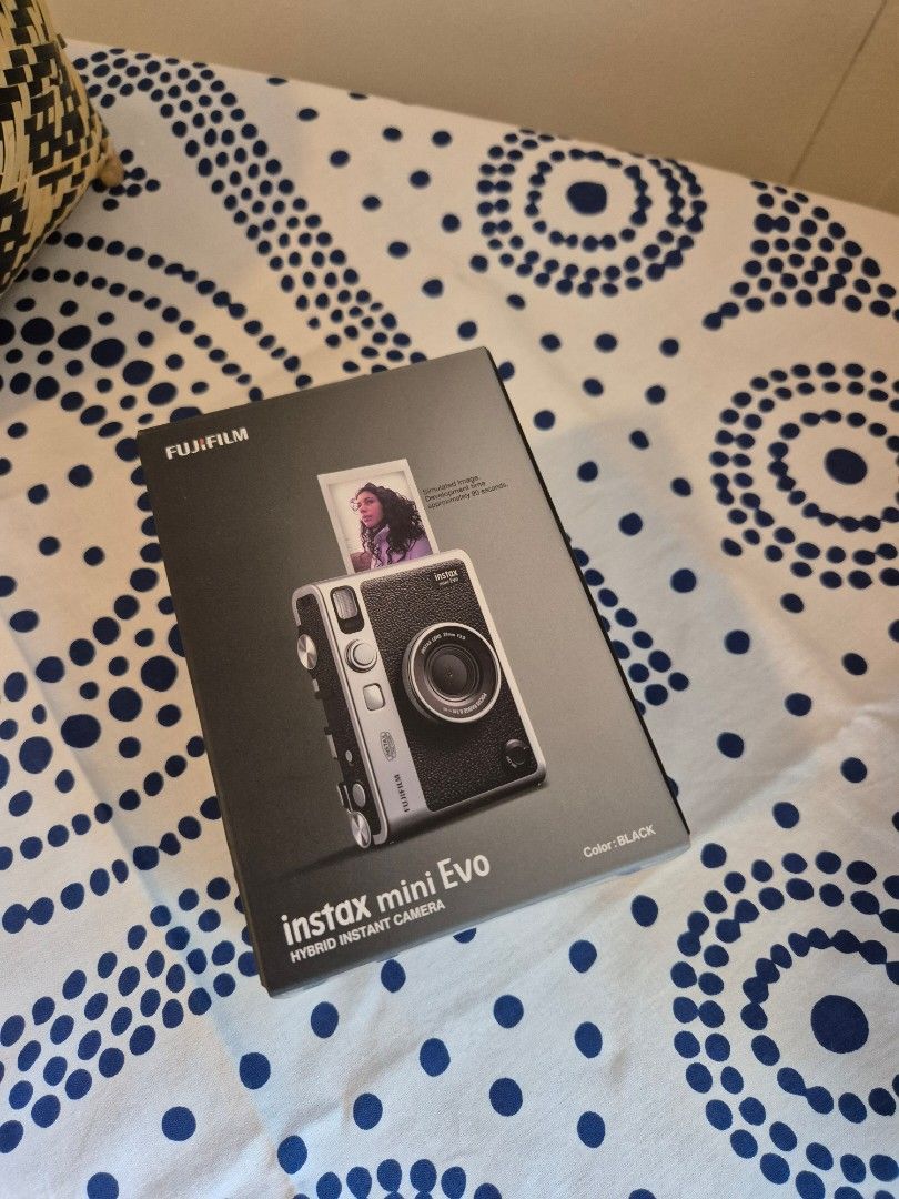 Instax Mini Evo (Category: Cameras) located in Manila. Submitted by biancahenares (Listing ID 1443788120, Image 1). Description: Instax Mini Evo ⭐️ BRAND NEW, never used - Color: Black - Retails for PHP13K! - 10 Film Effects, 10 Lens Effects - Can also print from smartphone - Just opened the box to check the product ⬇️ 💰 🚚 ⬇️ Payment & Shipping: - Bank Transfer, GCash - Location: QC and BGC - Lalamove, Grab (Buyer’s expense) - Must pay in full 