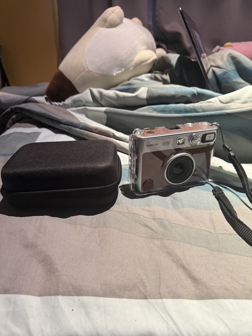 Instax mini evo (brown) (Category: Cameras) located in Quezon City. Submitted by soreal478 (Listing ID 1443751141, Image 1). Description: - Fujifilm Instax Mini Evo (Brown) - Hybrid instant camera (digital photos + instant prints) - Includes original box - Comes with a protective case - New 10PC sheet extra .