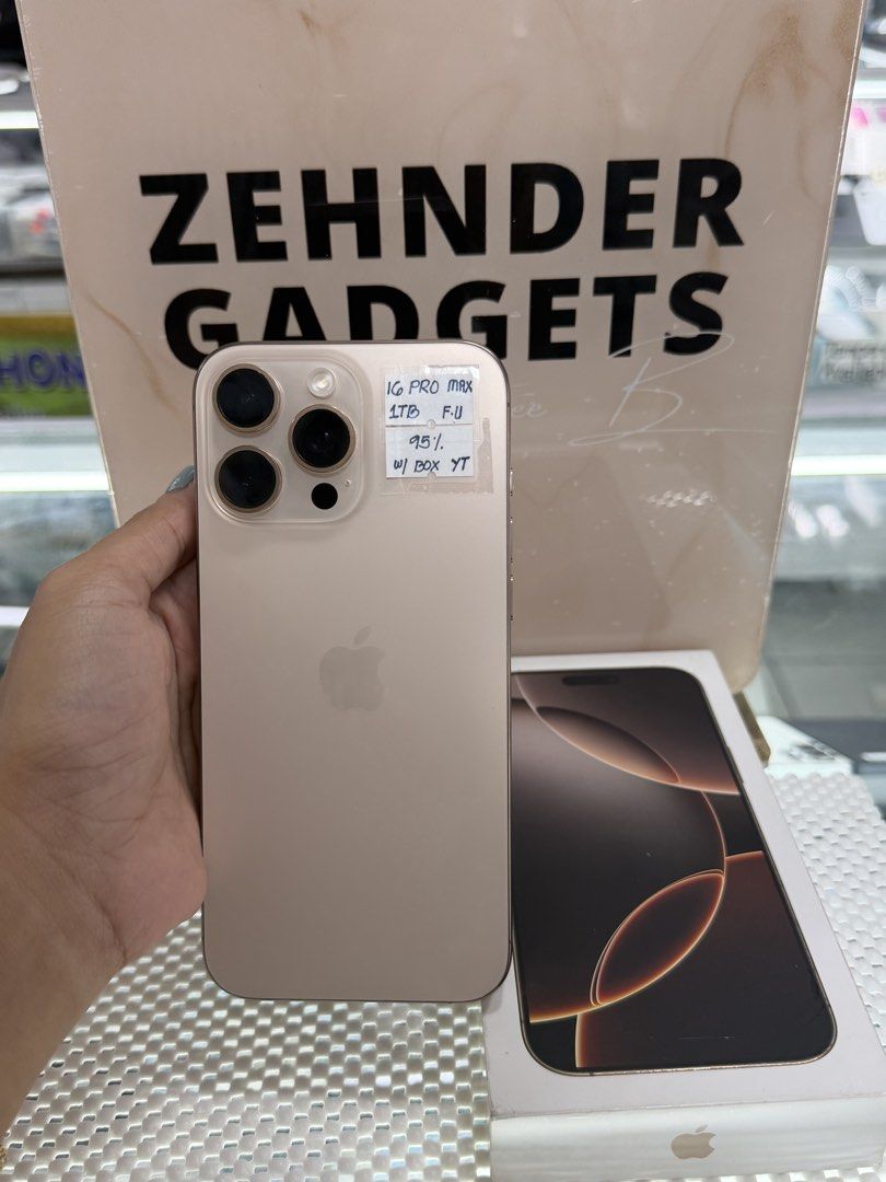 iPhone 16 PRO MAX 1TB OPENLINE (NTC APPROVED) (Category: iPhone 16 Series) located in San Juan City. Submitted by desireebayal96 (Listing ID 1443895430, Image 1). Description: iPhone 16 PRO MAX (DESERT TITANIUM) * NTC APPROVED * 1TB * OPENLINE (ANY SIM) * 95% BATTERY HEALTH (ORIGINAL) * 97% SMOOTH * NO ISSUE * NO HISTORY OF REPAIR * NOT REFURBISHED * WORKING FACE ID & TRUETONE * WITH CORD TYPE-C * WITH BOX SAME SERIAL OPEN FOR COD SAME DAY DELIVE