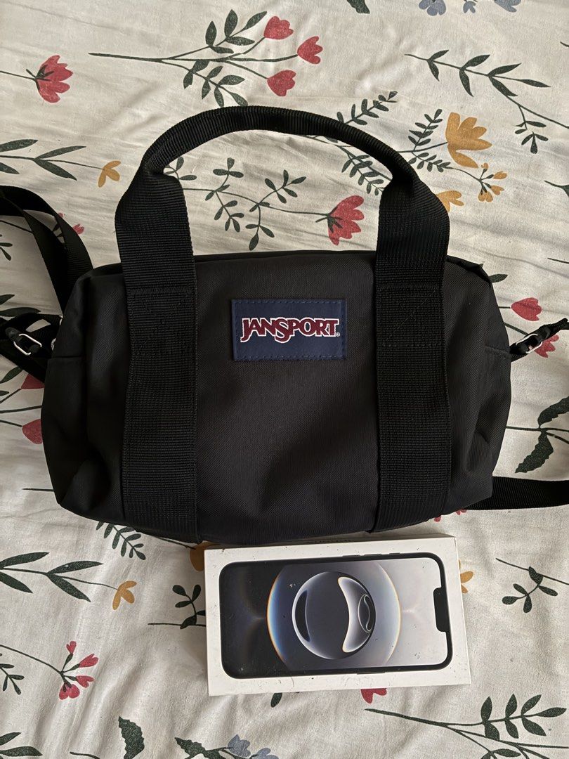 Jansport Black Duffle Bag with Shoulder Strap (Category: Backpacks) located in San Jose del Monte. Submitted by yllib1112 (Listing ID 1443708970, Image 1). Description: - Black Jansport duffle bag - Features top handles and a detachable shoulder strap - Unique 'JS' logo zippers - Lined interior - Ideal for everyday use or travel 1 week lng nagamit, bagong bago no issue. 1990 orig price.