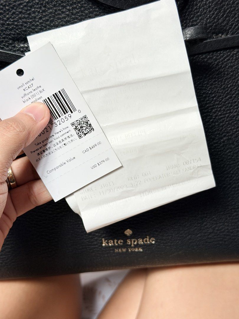 Kate Spade Small Satchel Black Leather KC417 (Category: Luxury Bags & Wallets) located in Manila. Submitted by almacringdp (Listing ID 1443761421, Image 2). Description: - Authentic Kate Spade small satchel - Kate Spade Hayes Street Sam - Material: Black pebbled leather - Elegant tassel details - Versatile: Comes with a detachable crossbody strap for hands-free wear - Interior: Lined with a lovely light pink leather - Value: Original tag shows co