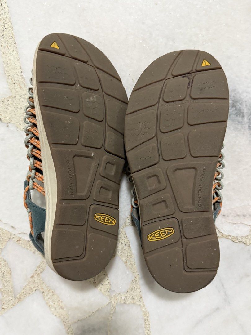 Keen Uneek Blue Orange Sandals (Category: Sandals) located in Singapore. Submitted by souljourner (Listing ID 1443734706, Image 3). Description: Selling as underused and doesn't fit my style. Comes in original box. Price is negotiable. Two cords and a sole. UNEEK adapts to your feet for the perfect fit, with free-moving cords that provide freedom of movement, security, and structure..