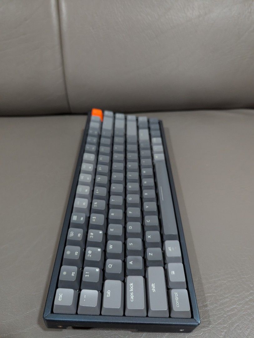 Keychron K2 Mechanical Keyboard (Category: Computer Keyboard) located in Makati City. Submitted by bon.bon.bon (Listing ID 1443763299, Image 3). Description: - Keychron K2 mechanical keyboard - RGB, Aluminum, Gateron Brown keys, Non-HotSwap - Wireless via Bluetooth, MacOS compatible - Compact 75% layout - Includes USB-C cable and extra keycaps.
