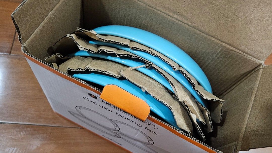 Le Creuset Circular Baking Tray Stoneware (Category: Bakeware) located in Quezon City. Submitted by brigdog (Listing ID 1443821476, Image 2). Description: - Le Creuset circular baking trays - Beautiful light blue color - Made from durable stoneware - Ideal for baking small tarts and quiches - Comes in original packaging - Stackable design for convenient storage.