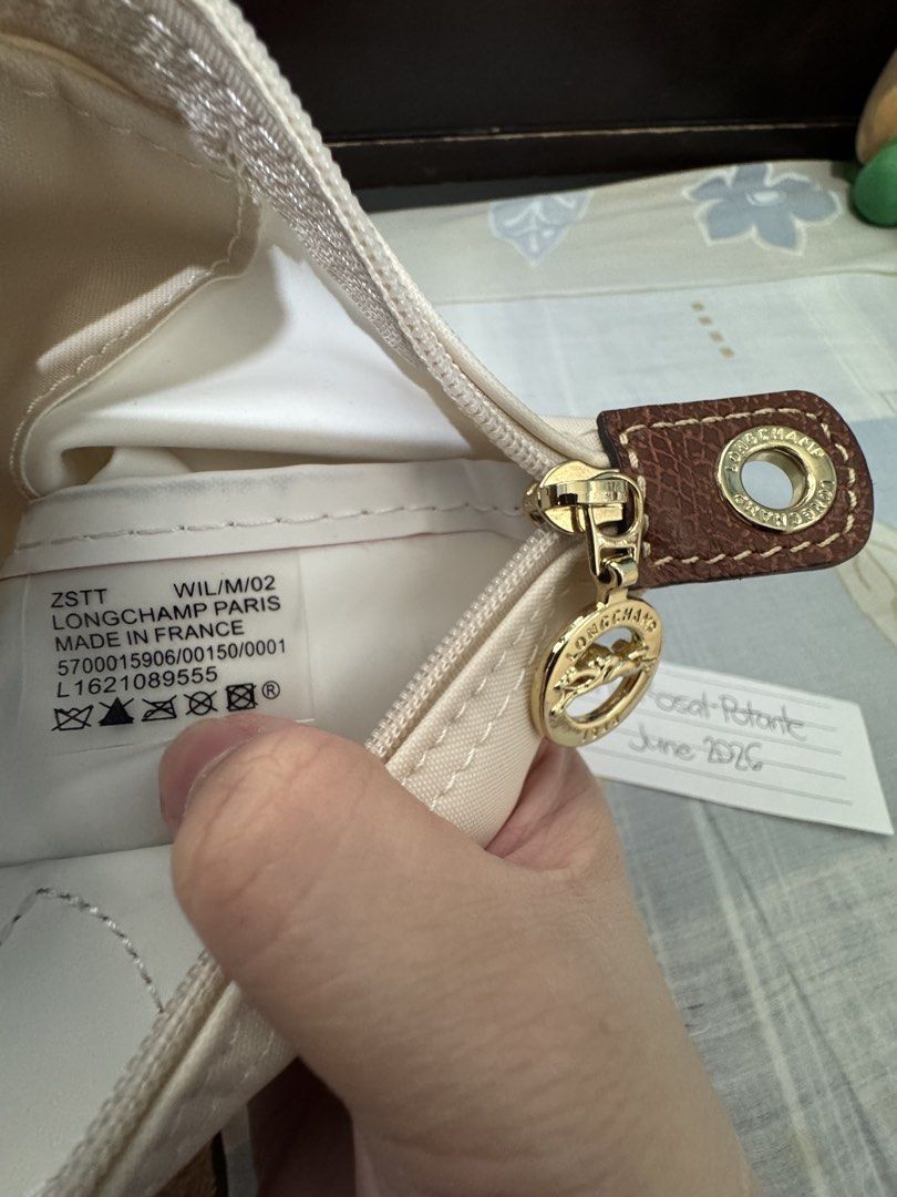 Longchamp Le Pliage Small Crossbody (Category: Luxury Bags & Wallets) located in Tanza. Submitted by chi_0826 (Listing ID 1443778008, Image 2). Description: Authentic Longchamp Le Pliage Paper Crossbody 2,500 + SF *Small *Complete inclusions (tags & packaging) *Free silk bag insert & 2 generic straps *No damage RFS: Too many bags Location: Tanza, Cavite Courier: Lalamove, J&T, or LBC .