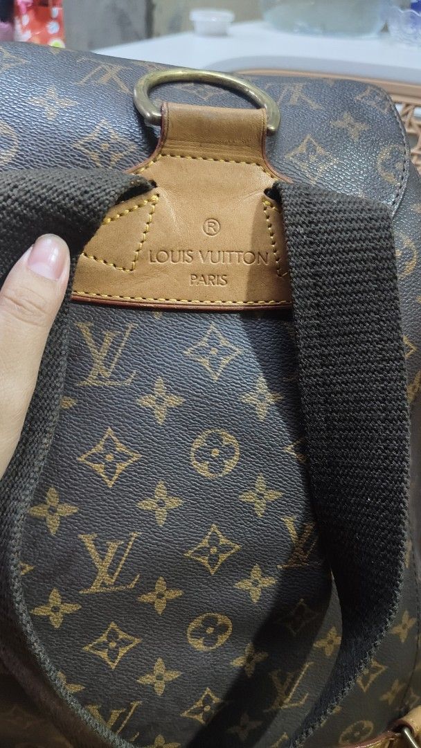 Louis Vuitton Monogram Canvas Backpack (Category: Luxury Bags & Wallets) located in Caloocan City. Submitted by casseyann26-05661 (Listing ID 1443778025, Image 3). Description: Louis Vuitton Monogram Backpack - Classic Monogram Canvas - Secure Drawstring and Buckle Flap Closure - Durable Leather Trim and Straps - Spacious Interior for Essentials - Ideal for Daily Use or Travel - Noteworthy: Some signs of wear on leather trim and base.