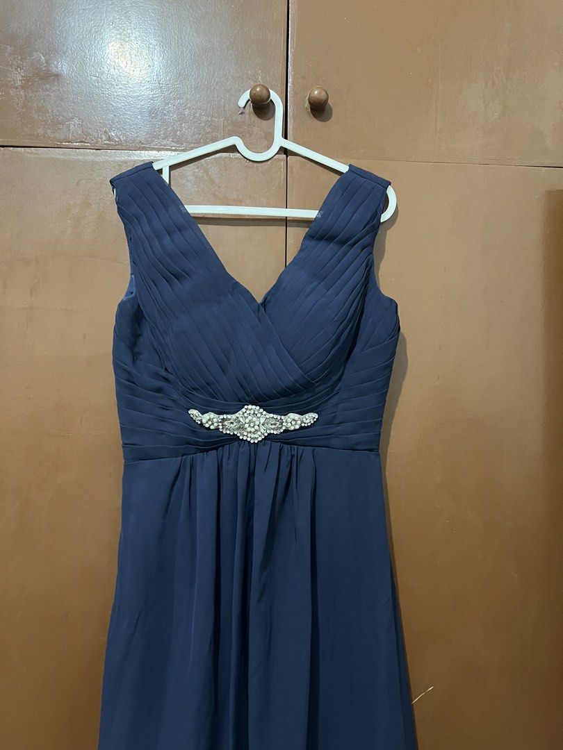 MaCo Navy Blue V-Neck Gown (Category: Evening dresses & gowns) located in Manila. Submitted by t_rix (Listing ID 1443869141, Image 2). Description: - Navy blue floor-length gown - V-neckline with pleated bodice detailing - Rhinestone embellishment at the waist - Sleeveless design - Zipper closure at the back - Ideal for formal events.