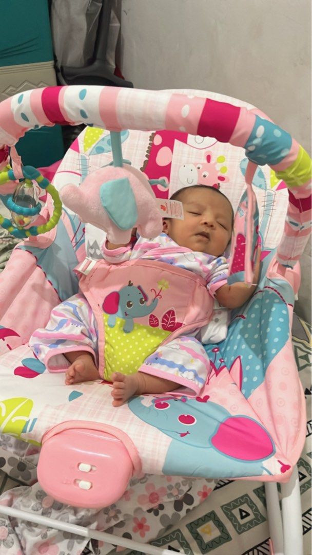 Mastela Bouncer Pink Giraffe Pattern (Category: Infant Playtime) located in Cavite. Submitted by raikkojamesarol (Listing ID 1443757982, Image 2). Description: -Mastela brand - Adorable pink baby bouncer with a cute giraffe print. - Comes with a toy bar featuring engaging hanging toys. - Features a padded seat for maximum baby comfort. - Sturdy and reliable metal frame construction. - Ideal for keeping your little one entertained and content. -Al