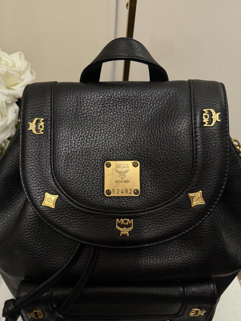 Authentic MCM Germany Backpack Black Leather Large Authentic Vintage (Category: Luxury Bags & Wallets) located in Dasmarinas. Submitted by goaldeluxe (Listing ID 1443904240, Image 2). Description: overall : great condition. — Measurement — Height 13.5”(34.29 cm) Depth 5.75”(14.61 cm) Length (bottom) 10.37”(26.34 cm) .