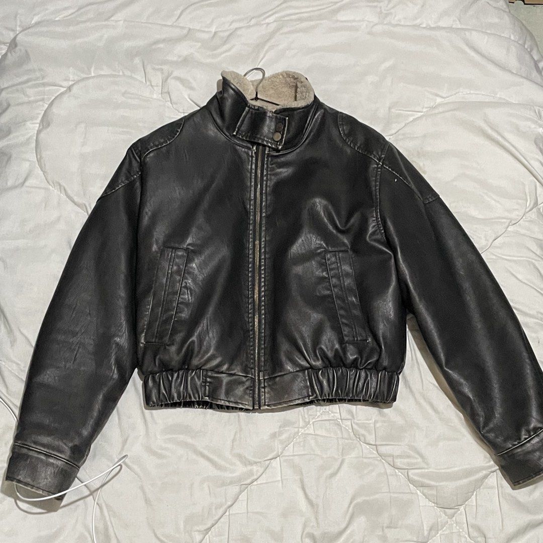 Men's Faux Leather Bomber Jacket with Shearling Collar (Category: Coats, Jackets and Outerwear) located in Manila. Submitted by swiftwhale.cc2e6e (Listing ID 1443782152, Image 1). Description: - Classic faux leather bomber jacket - Lined with warm shearling for comfort - Ribbed cuffs and hem - Zipper closure - Two front pockets - Ideal for cooler weather - Pairs well with jeans or casual pants.