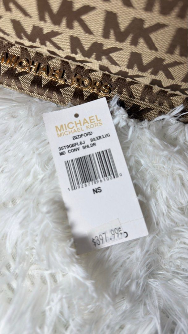 Michael Kors Bedford Hobo (Category: Luxury Bags & Wallets) located in Taguig. Submitted by rodriguezjamieanne (Listing ID 1443757105, Image 2). Description: - used once only - Authentic Michael Kors Bedford shoulder bag - Classic brown and beige MK monogram print - Elegant gold hardware details - Interior with zip pocket and multiple compartments - Comes with original tag - Ideal for everyday use.