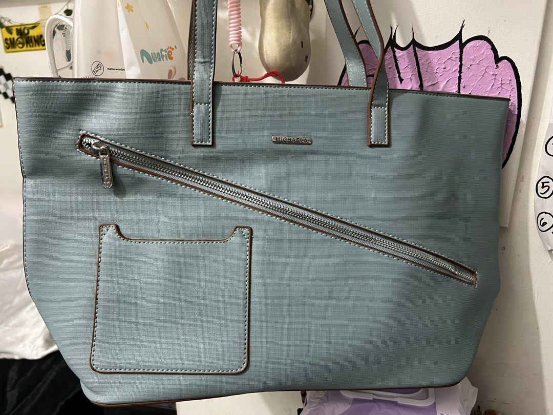 Michaela Totebag (Category: Luxury Bags & Wallets) located in Malabon City. Submitted by rika_26 (Listing ID 1443771578, Image 1). Description: Never used Spacious Perfect for students .