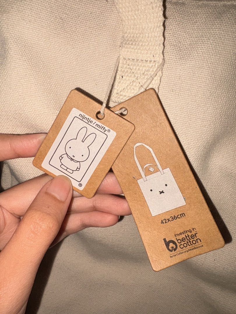 Miffy Tote Bag - Beige Cotton Canvas (Category: Tote Bags) located in Quezon City. Submitted by mayamaya17 (Listing ID 1443885183, Image 2). Description: - Adorable Miffy design - Bought in the Netherlands 🇳🇱 - Beige canvas material - Spacious size: 42x36cm - Made with 100% Cotton - Perfect for everyday use RFS: I have two of them.