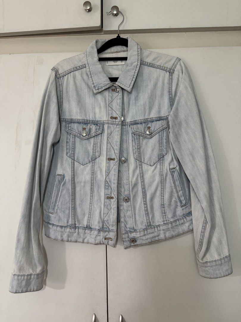 MNG Denim Light Wash Denim Jacket Size M (Category: Coats, Jackets and Outerwear) located in Manila. Submitted by chescapades (Listing ID 1443733860, Image 1). Description: - Classic light wash denim jacket from MNG - Button front closure - Two chest pockets - Long sleeves with button cuffs - Perfect staple piece for any outfit.
