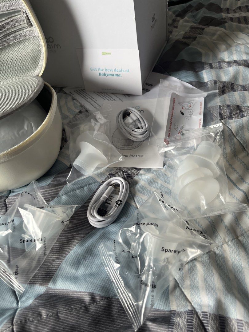 Naim Plus Double Electric Breast Pump with Accessories (Category: Breastfeeding & Bottle Feeding) located in Pasig City. Submitted by stormyera19 (Listing ID 1443788346, Image 3). Description: - Naim Plus double electric breast pump - Includes travel case - All original accessories included - Spare parts and charging cables provided (unused) - Neatly packed for convenience - Ideal for pumping on the go - Original box included Bought from Babymama