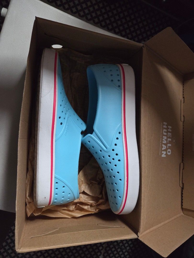 Native Miles Shoes Blue Shell White (Category: Sneakers) located in Manila. Submitted by eveeven (Listing ID 1443783869, Image 2). Description: - Brand: Native size 8 for women - Model: Miles - Color: Light Blue - Style: Slip-on - Sole: White with Native logo and red stripe detail - Condition: Comes with original box - Ideal for: Casual wear orig box orig price 2990 used once only.