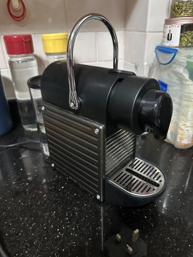 Nespresso machine (pixie) (Category: Coffee Machines & Makers) located in Singapore. Submitted by leggy1923 (Listing ID 1443862666, Image 1). Description: - Nespresso machine (Pixie) in mint condition - Clear water tank - Power cord attached - collect from Dover parkview.
