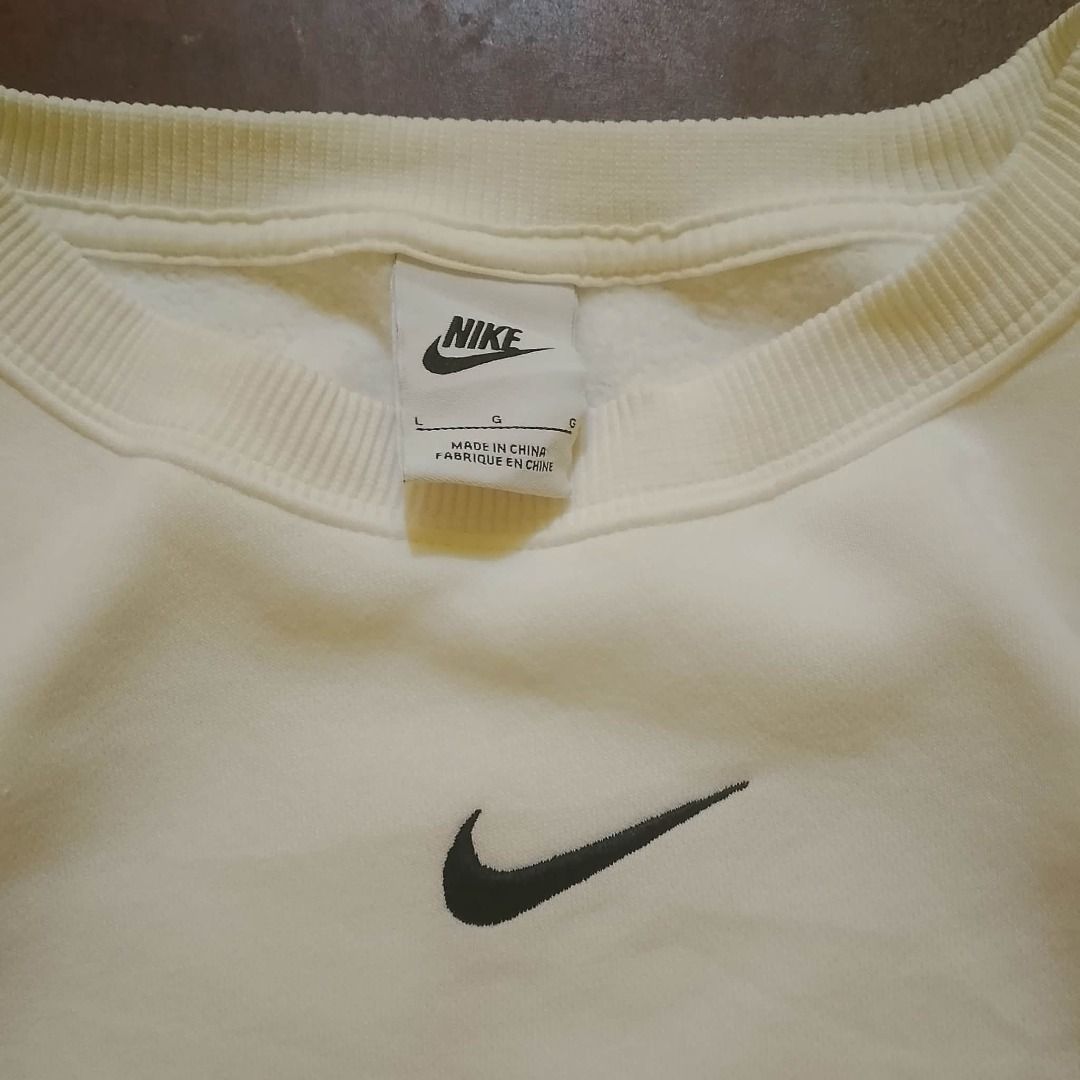Nike Cropped Crewneck Sweater (Embroid Logo) (Category: Coats, Jackets and Outerwear) located in Cagayan de Oro. Submitted by drp.central (Listing ID 1443905181, Image 3). Description: Nike Cropped Crewneck Sweater (Embroid Logo) Dimes: W - 25" L - 21" Color: White Complete tags ✅ Color Rate: 10/10 Condition: 10/10 Issue: None No return/ refund Can ship using J&t 🏷️- P750 +sf.