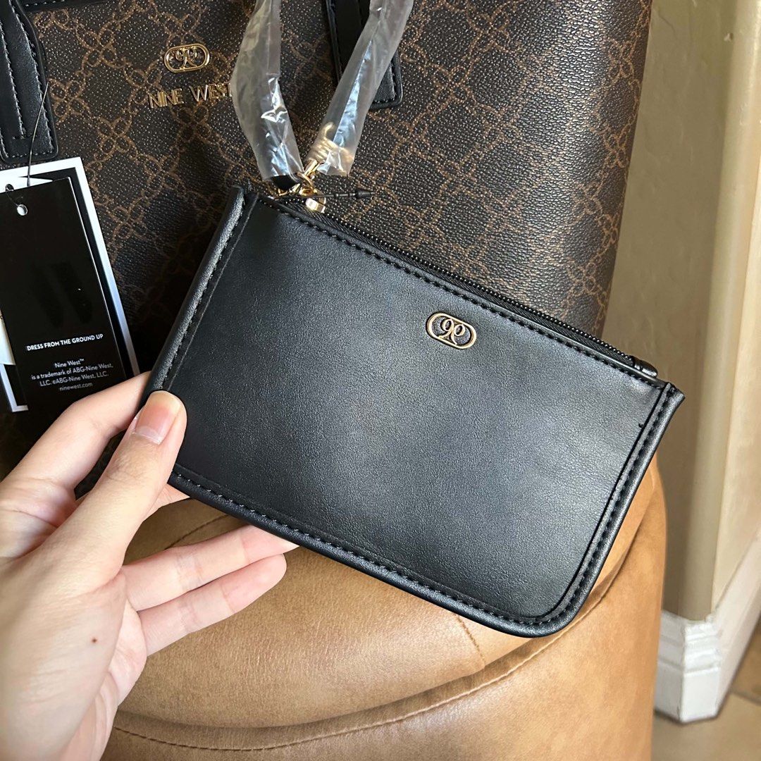 Nine West Monogram Tote Bag with Matching Pouch (Category: Luxury Bags & Wallets) located in San Pablo. Submitted by simplicitybeaute (Listing ID 1443727466, Image 3). Description: .
