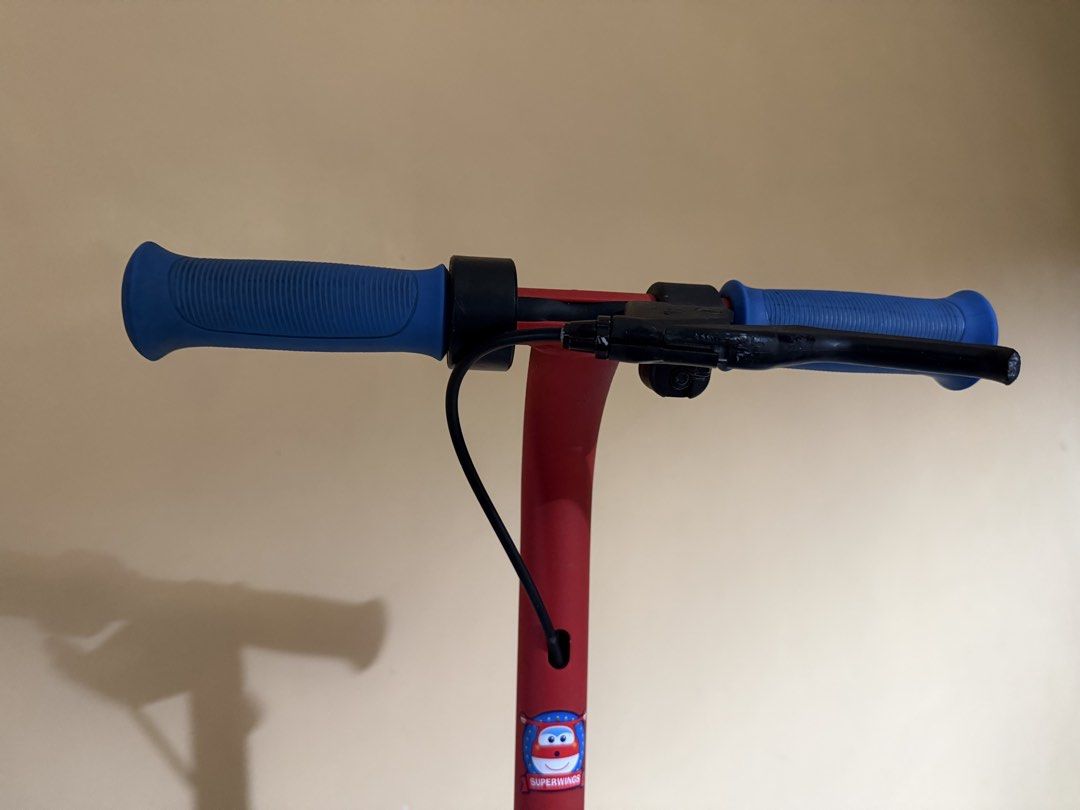 Ninebot Kids Electric Scooter - Red (Category: Skates, Rollerblades & Scooters) located in Pasig City. Submitted by paisley_kd.2018 (Listing ID 1443744807, Image 2). Description: - Red Ninebot electric scooter for kids - Blue accents on handlebars, wheels, and frame - Includes kickstand - Shows normal signs of use: scuffs and wear marks on body and deck - Perfect for kids to get around! - charger and helmet included.