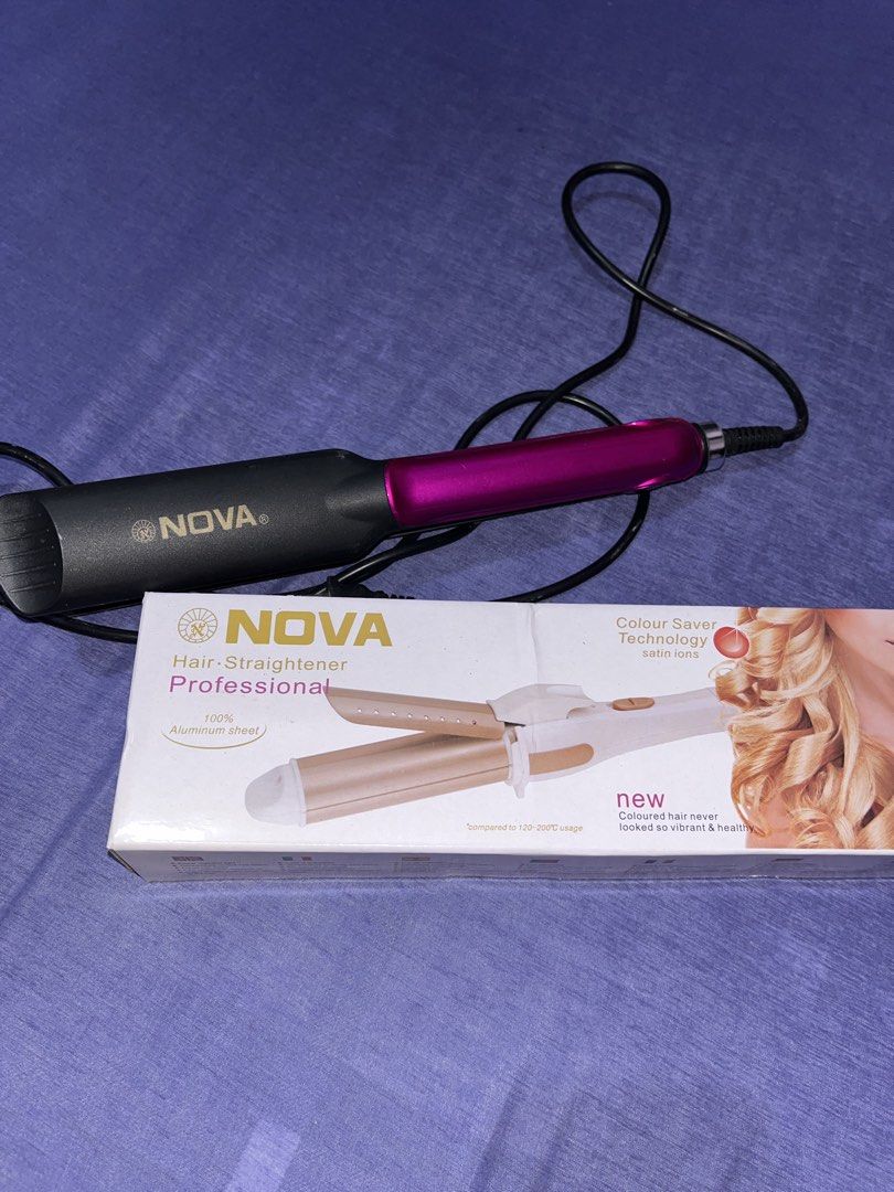 NOVA Professional Hair Straightener and Curler (Category: Hair) located in Manila. Submitted by declutter0_0 (Listing ID 1443808521, Image 2). Description: - 150 for two - NOVA Professional Hair Straightener and Curler Set - Includes original packaging - Straightener: Black & Purple - Curler: White & Gold - Electric powered for easy use - Perfect for at-home hair styling - Bubble wrap included for safe delivery.
