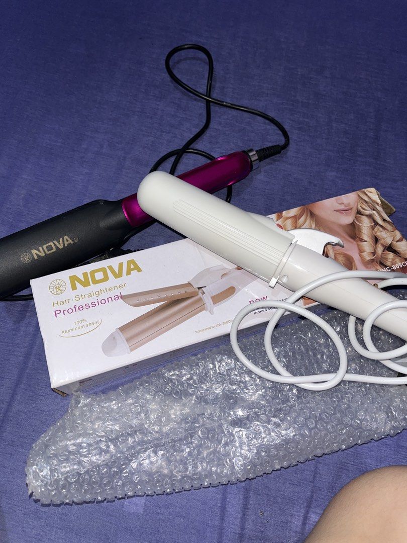 NOVA Professional Hair Straightener and Curler (Category: Hair) located in Manila. Submitted by declutter0_0 (Listing ID 1443808521, Image 3). Description: - 150 for two - NOVA Professional Hair Straightener and Curler Set - Includes original packaging - Straightener: Black & Purple - Curler: White & Gold - Electric powered for easy use - Perfect for at-home hair styling - Bubble wrap included for safe delivery.
