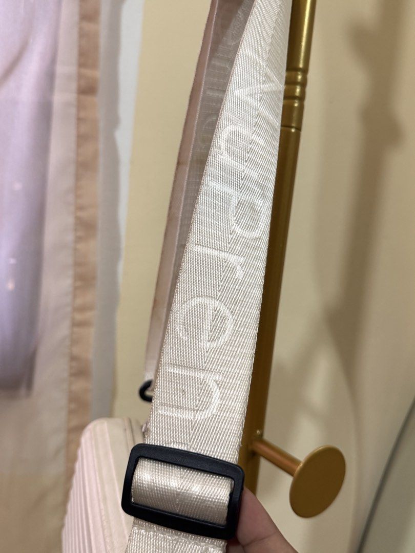 Nuprene Lucca Bag in Off-White (Category: Sling Bags) located in Pasig City. Submitted by cattleyass (Listing ID 1443753476, Image 2). Description: No issues. Need cleaning‼️ Comes with leather strap Auto Pass sa low ball Last price posted.