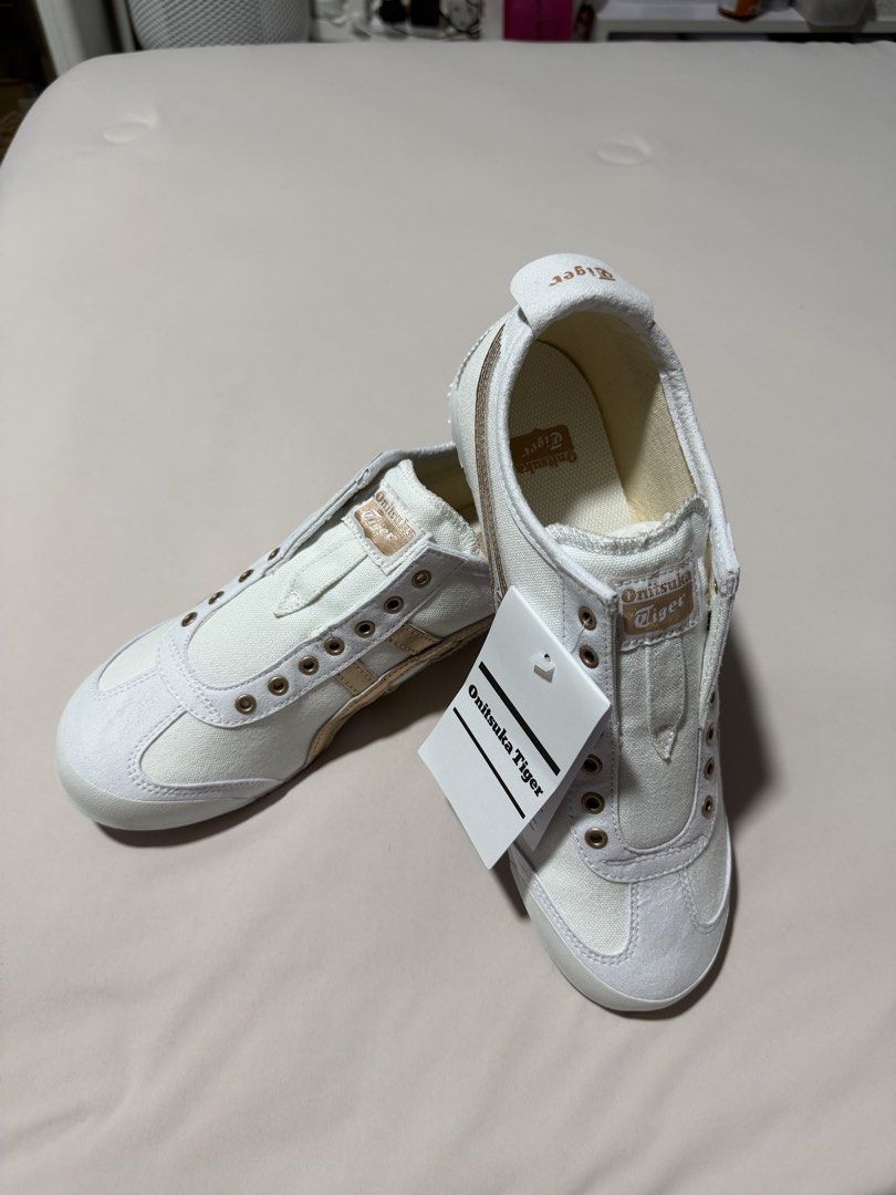 Onitsuka Tiger Mexico 66 Slip-On White Rose Gold Sneakers (Category: Sneakers) located in Singapore. Submitted by resilence (Listing ID 1443831312, Image 1). Description: Letting go coz bought the wrong size from Japan - Brand: Onitsuka Tiger - Model: Mexico 66 Slip-On - Color: White with Rose Gold - Style: Easy slip-on - Condition: Brand new with original tags - Size: 25.5cm/ EU40.5/ US 7.5 Price can be negotiated for genuine buyer. No lowballer