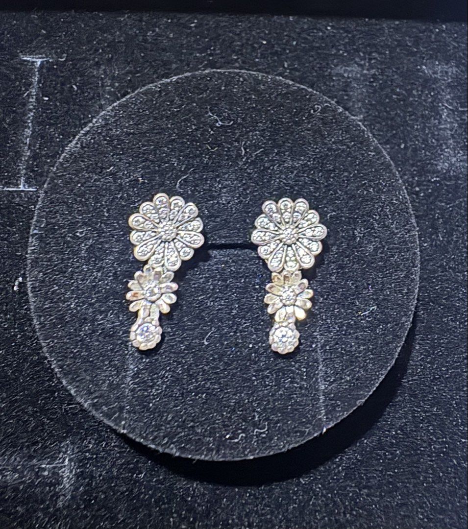Pandora Sparkling Daisy Flower Trio Stud Earrings (Category: Earrings) located in Davao. Submitted by my_picks (Listing ID 1443870401, Image 1). Description: Pandora Sparkling Daisy Flower Trio Stud Earrings •Sterling Silver (S925) •Clear Cubic Zirconia •Authentic Pandora •Never used •Comes with Pandora box Received as a gift years ago and has been safely stored since then. Never had the chance to use it, so I’m letting it go to someone who will 