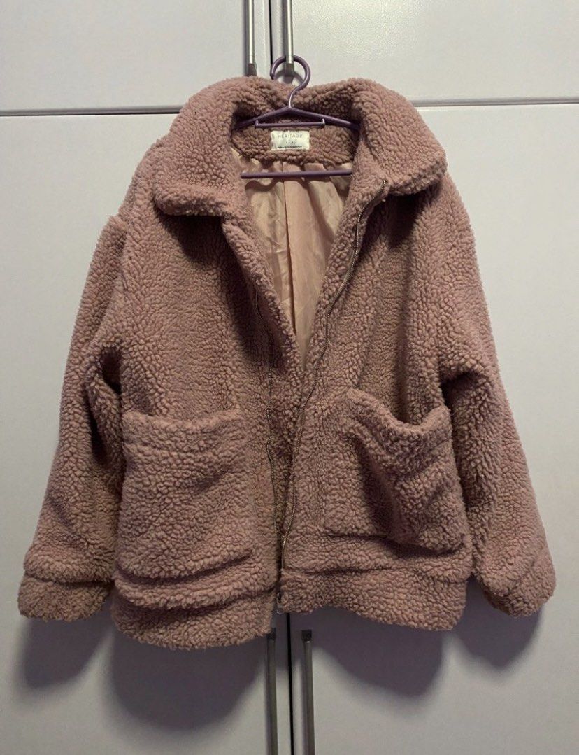 Pink Teddy Bear Fleece Jacket with Zip and Pockets (Category: Coats, Jackets and Outerwear) located in Bacoor. Submitted by _myprelovedcloset (Listing ID 1443757916, Image 3). Description: - Super cozy pink teddy bear fleece jacket - Zip-up front - Two front pockets - Lined inside for extra warmth - Perfect for chilly days - Soft and comfortable feel.