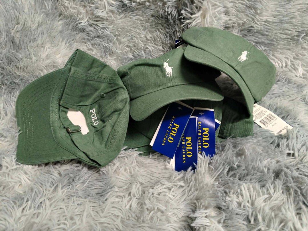 Polo Ralph Lauren Caps - Various Colors Available (Category: Caps & Hats) located in Manila. Submitted by jjsbentables (Listing ID 1443731274, Image 2). Description: - Brand: Polo Ralph Lauren - Available Colors: Navy, Black, White, Cream, Olive Green, Blue - Feature: Signature embroidered Polo player logo on front - Condition: Some caps still have tags attached - Style: Ideal for everyday wear and completing casual outfits.