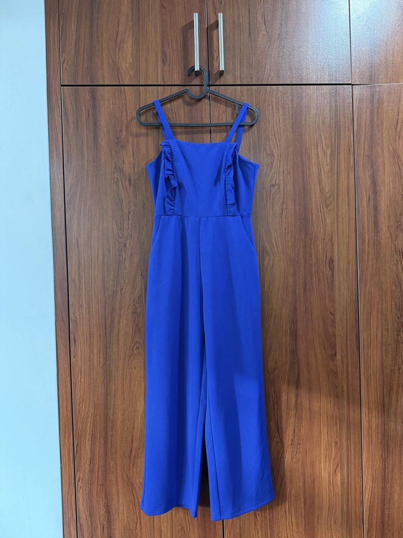 Pomelo Royal Blue Ruffle Jumpsuit Size S (Category: Jumpsuits) located in Quezon City. Submitted by closetcute (Listing ID 1443828584, Image 1). Description: Square neckline Ruffle detail Back zip closure Wide leg culotte style With pockets!.