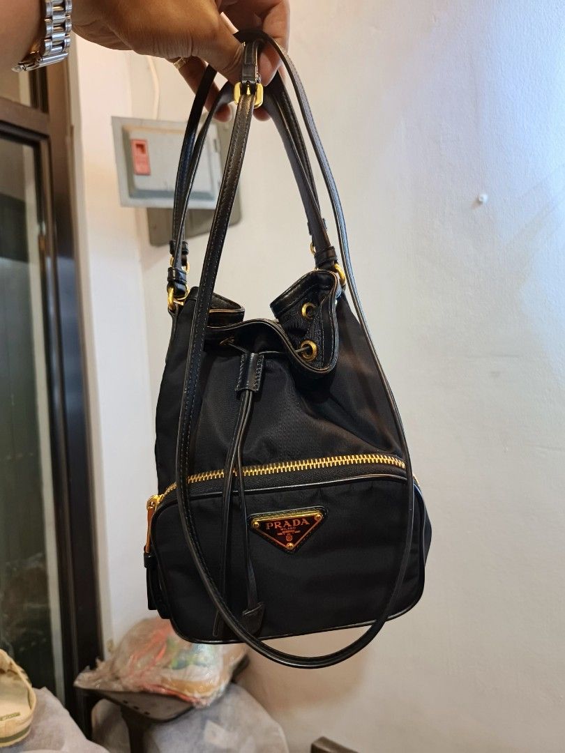 Prada duet small re-nylon bucket bag (Category: Luxury Bags & Wallets) located in Quezon City. Submitted by rc.cici (Listing ID 1443818519, Image 1). Description: good as new guarantee authentic no inclusion provided dust bag only.